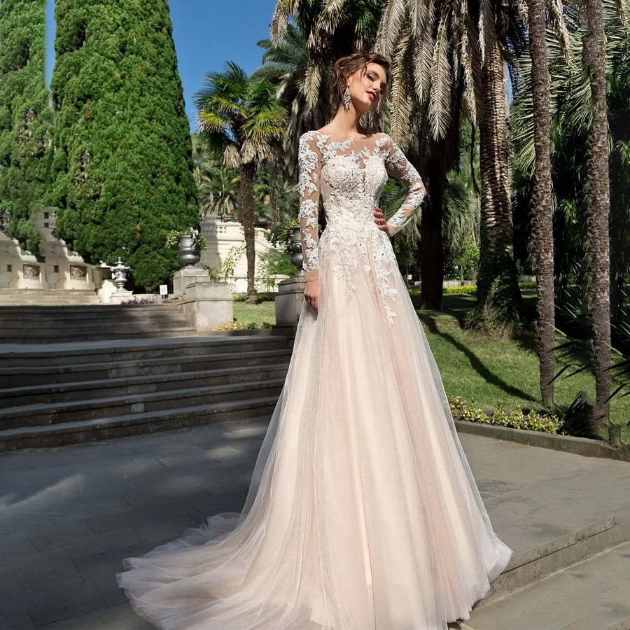 Scoop Neck Long Sleeves Bridal Dress Applique Lace with Crystals Lace Up/Zipper Champagne Wedding Dress
Scoop Neck Long Sleeves Bridal Dress Applique Lace with Crystals Lace Up/Zipper Champagne Wedding Dress
