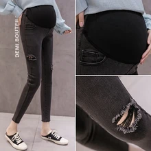 Pregnant women's jeans spring and autumn models wear nine-point fashion ripped Korean version of pregnant women's feet pants