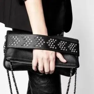 Женская сумочка из натуральной кожи, с бусинами и заклепками
Женская сумочка из натуральной кожи, с бусинами и заклепками