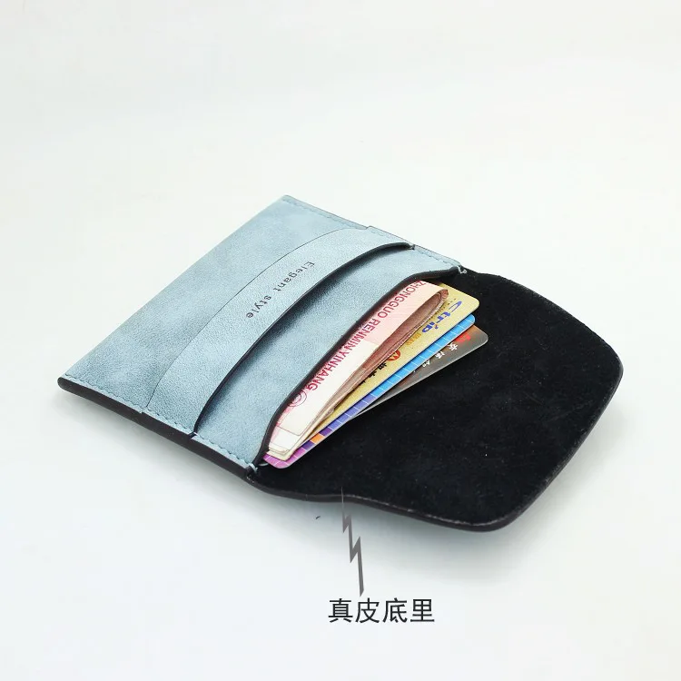 Ladies wallet new ultra-thin practical mini wallet solid color simple drawstring frosted leather retro card holder coin purse 
Ladies wallet new ultra-thin practical mini wallet solid color simple drawstring frosted leather retro card holder coin purse