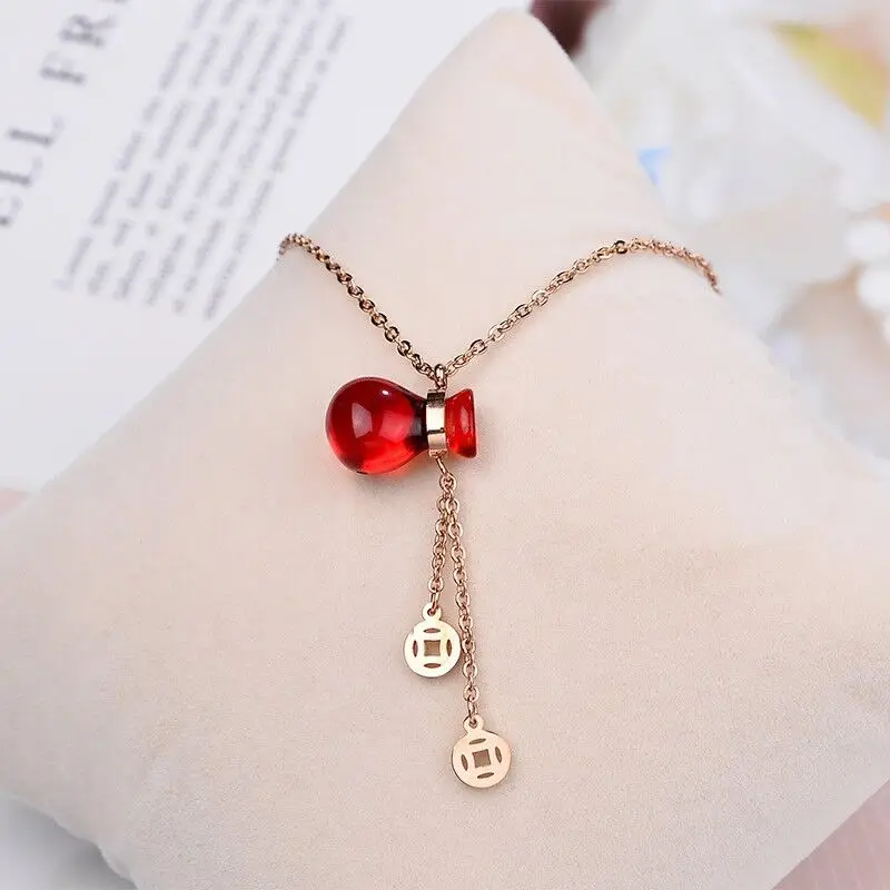 Hot selling personality wild niche design titanium steel red gourd coin tassel red wallet fashion pendant clavicle chain
Hot selling personality wild niche design titanium steel red gourd coin tassel red wallet fashion pendant clavicle chain