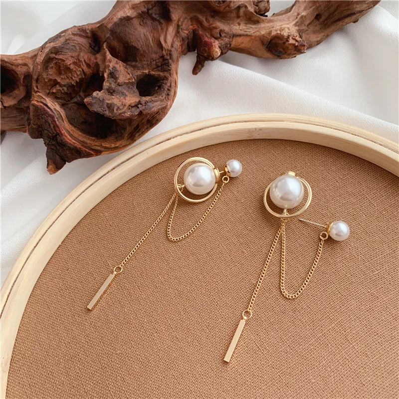 Korean Front and rear pearl luxury tassel pendant long style studs earrings for women temperament personality jewelry 
Korean Front and rear pearl luxury tassel pendant long style studs earrings for women temperament personality jewelry