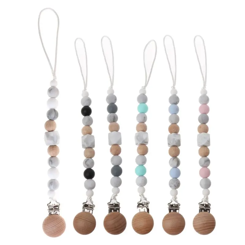 Зажимы для пустышки из силикона и бука, деревянная пустышка зажимов, цепочка, жевательная игрушка для новорожденных
Зажимы для пустышки из силикона и бука, деревянная пустышка зажимов, цепочка, жевательная игрушка для новорожденных