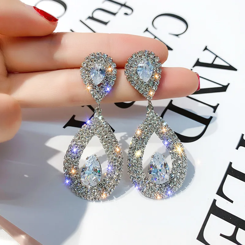 925 Silver Needle Korean Personality Versatile Super Flash Diamond Drop Shaped Net Red Minority Design Earrings, Ladies
925 Silver Needle Korean Personality Versatile Super Flash Diamond Drop Shaped Net Red Minority Design Earrings, Ladies