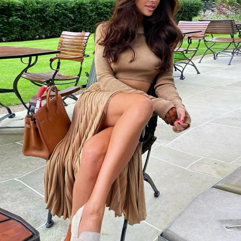 Autumn and Winter Knitted Pullover Sweater with Open Ends Fashion Sexy Pleated Skirt Suit Women
Autumn and Winter Knitted Pullover Sweater with Open Ends Fashion Sexy Pleated Skirt Suit Women