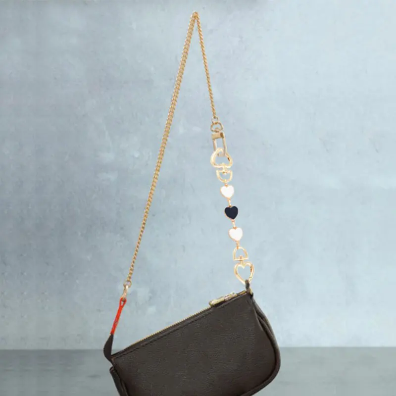 1 шт. удлинительная цепочка для сумок в форме сердца, ремешок на плечо, универсальные аксессуары для сумок с подвесной пряжкой, изысканный де... 
1 шт. удлинительная цепочка для сумок в форме сердца, ремешок на плечо, универсальные аксессуары для сумок с подвесной пряжкой, изысканный де...