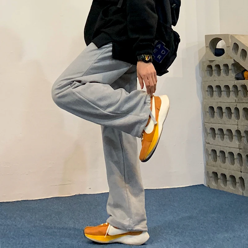 Gray guard pants men's Korean version of the trend of all-match loose feet loose straight sports drawstring casual pants
Gray guard pants men's Korean version of the trend of all-match loose feet loose straight sports drawstring casual pants