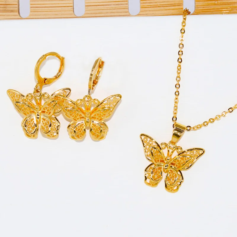 Moda mariposa Dubai pequeños juegos de joyas para mujer 24K collar de oro, colgante pendientes conjunto de Etiopía de boda, rega
Moda mariposa Dubai pequeños juegos de joyas para mujer 24K collar de oro, colgante pendientes conjunto de Etiopía de boda, rega