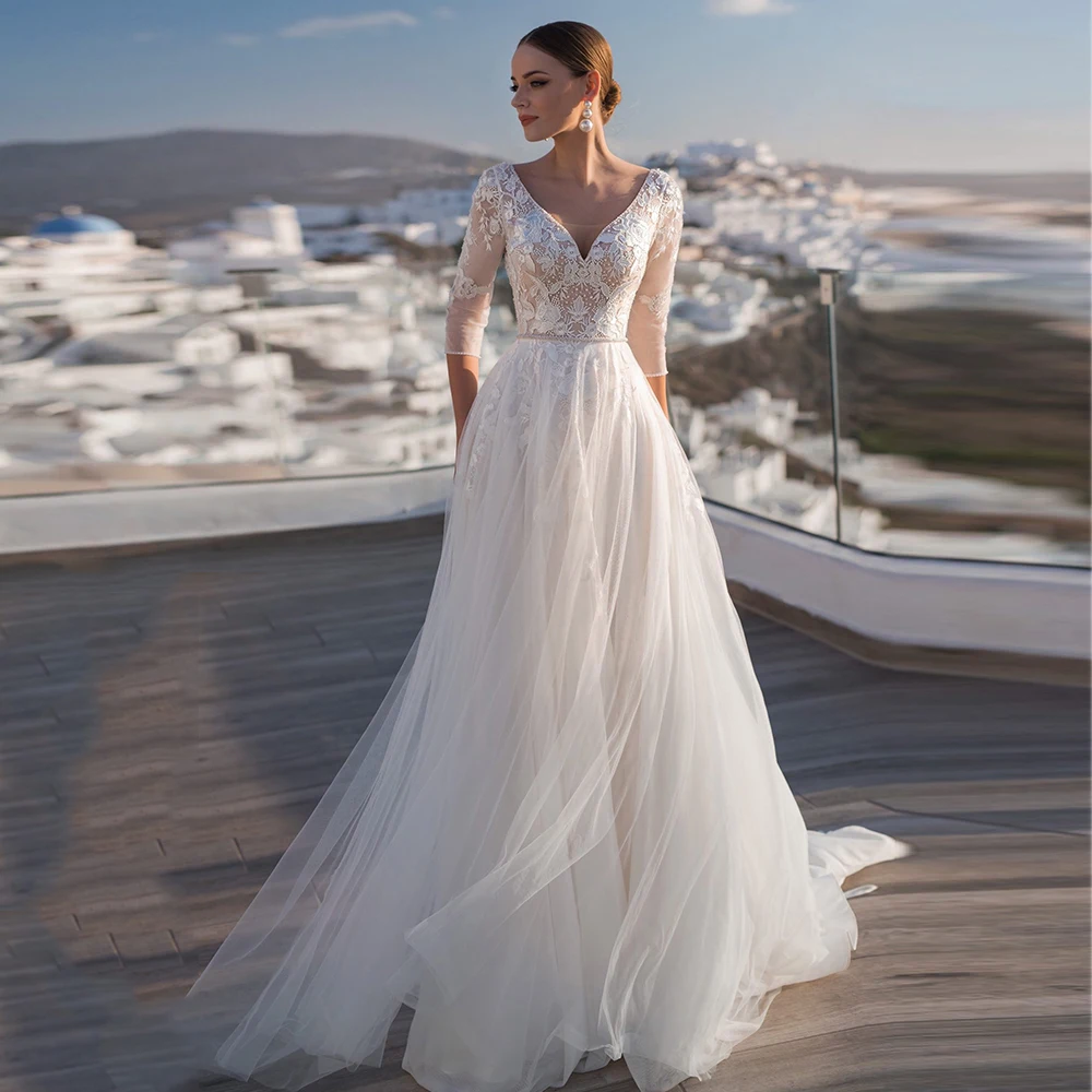 Charming Tulle Sweep Train Backless A-line Wedding Dresses V-neck Three Quarter Sleeve Applique Bridal Gowns with Beadding
Charming Tulle Sweep Train Backless A-line Wedding Dresses V-neck Three Quarter Sleeve Applique Bridal Gowns with Beadding