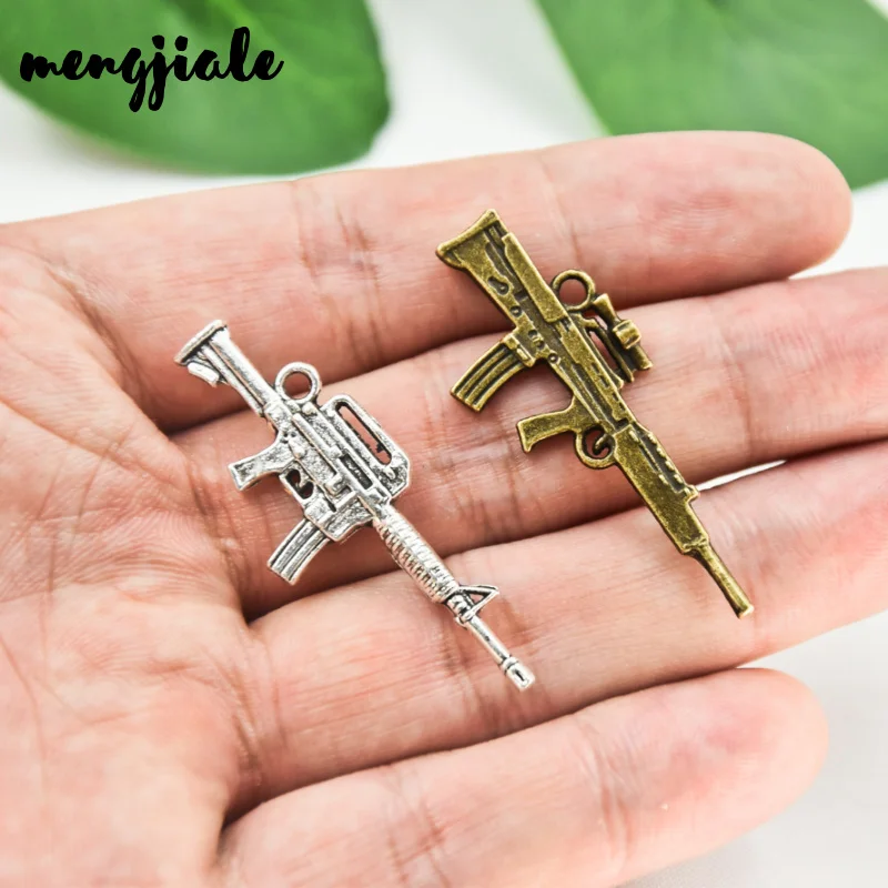 MENGJIALE 15pcs/lot Two Color 3D Gun Charm Pendant for DIY charms pendant necklace jewelry making 45*16mm
MENGJIALE 15pcs/lot Two Color 3D Gun Charm Pendant for DIY charms pendant necklace jewelry making 45*16mm