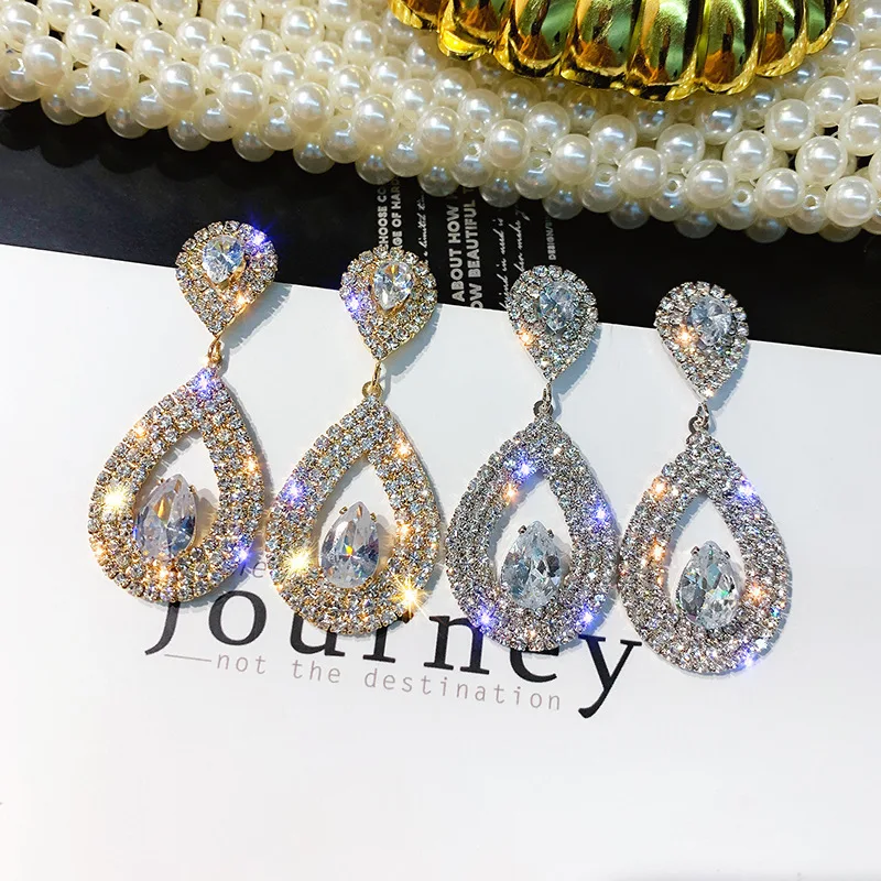 Origin Summer Luxury Bling Bling Waterdrop Hollow Dangle Earrings Foe Ladies Exquisite Rhinestone Earrings Wedding Jewelry
Origin Summer Luxury Bling Bling Waterdrop Hollow Dangle Earrings Foe Ladies Exquisite Rhinestone Earrings Wedding Jewelry