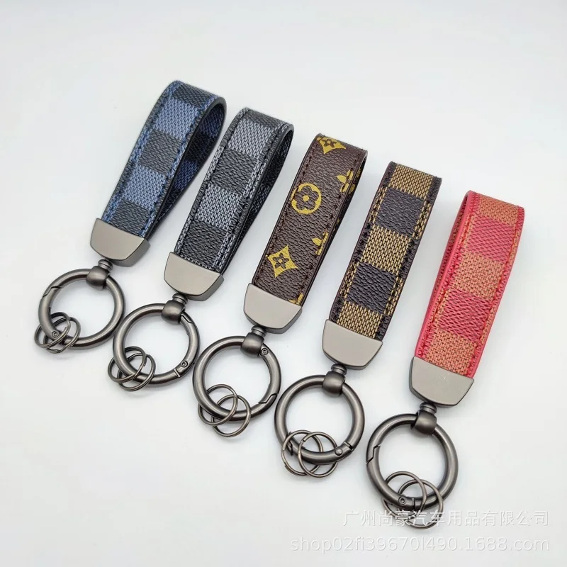 Luxury leather lanyard keychain men's and women's square design keychain bronze buckle car key chain jewelry gifts wholesale
Luxury leather lanyard keychain men's and women's square design keychain bronze buckle car key chain jewelry gifts wholesale