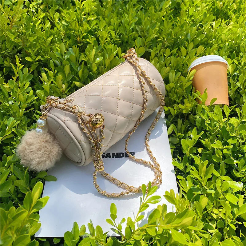 The new diamond pattern shoulder bag women's fashion trend solid color all-match high-quality chain white diagonal cylinder bag
The new diamond pattern shoulder bag women's fashion trend solid color all-match high-quality chain white diagonal cylinder bag