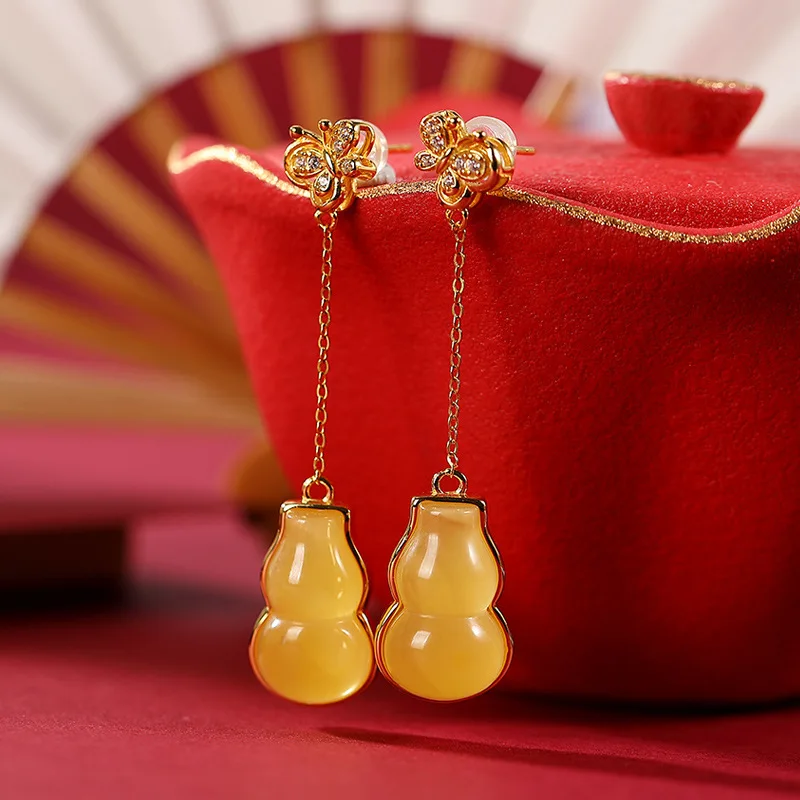 Natural 925 sterling silver gilt retro butterfly gourd amber earrings temperament sterling silver women earrings
Natural 925 sterling silver gilt retro butterfly gourd amber earrings temperament sterling silver women earrings