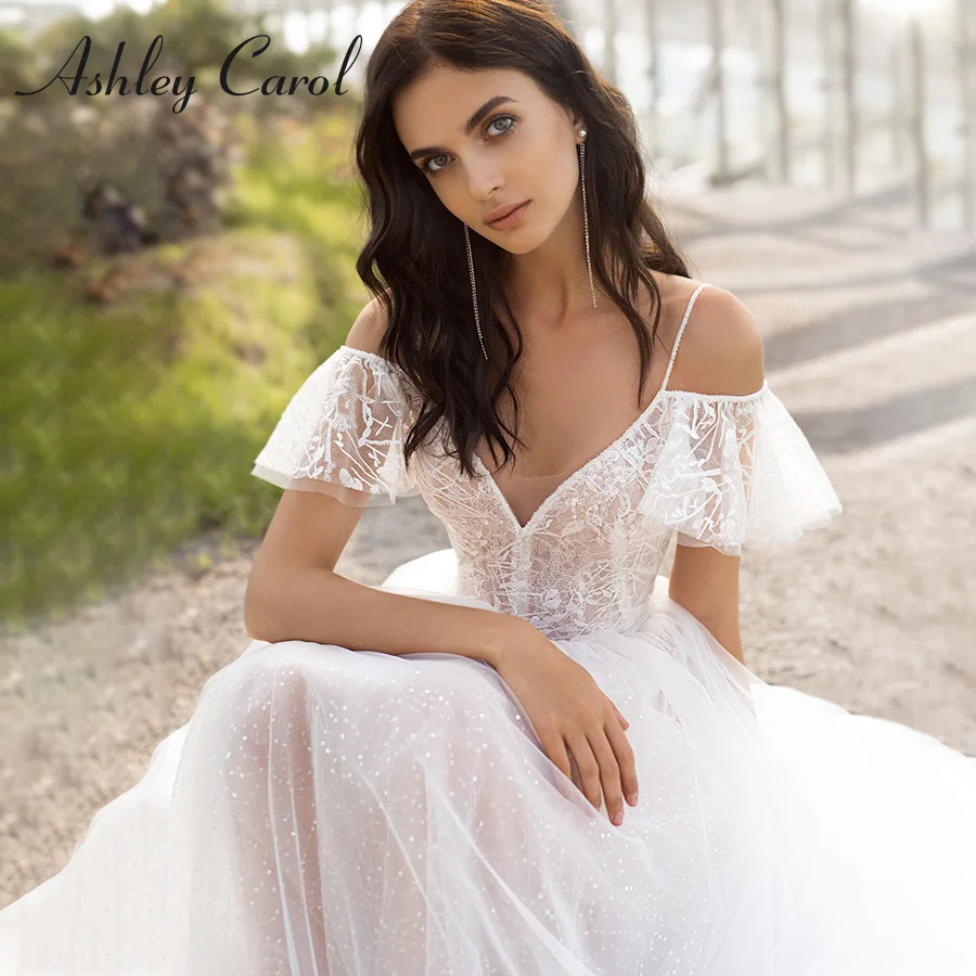 Свадебное платье трапециевидной формы Эшли Карол 2022 с цветочным узором и бусинами на тонких бретельках, пляжные платья невесты с v-образным вырезом и кружевной аппликацией, свадебное бохо-платье
Свадебное платье трапециевидной формы Эшли Карол 2022 с цветочным узором и бусинами на тонких бретельках, пляжные платья невесты с v-образным вырезом и кружевной аппликацией, свадебное бохо-платье