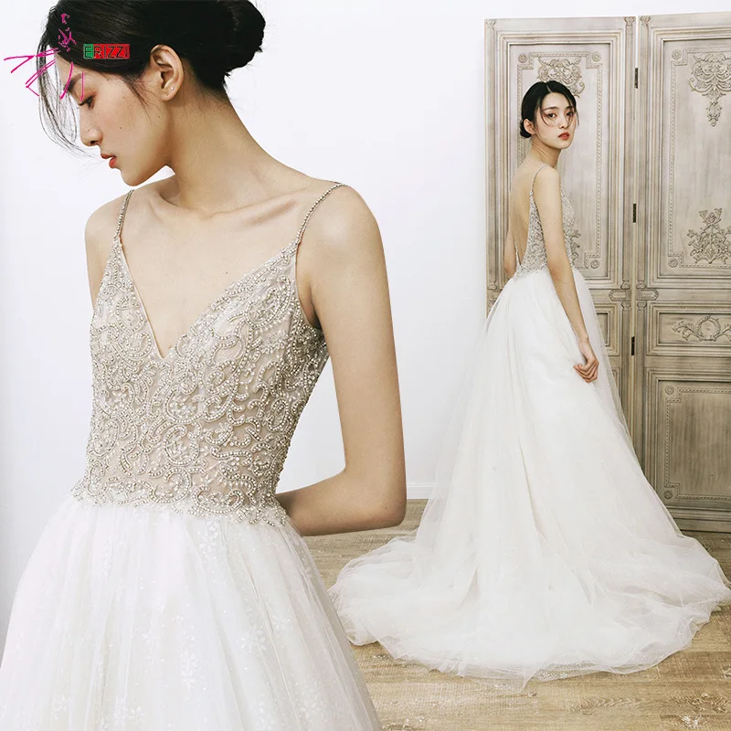 Embroidered V-neck Backless Dubai Luxury Wedding Dress 2020 Heavy Beading Backless Ball Gown Bride Dress Vestido Noiva Mariage
Embroidered V-neck Backless Dubai Luxury Wedding Dress 2020 Heavy Beading Backless Ball Gown Bride Dress Vestido Noiva Mariage