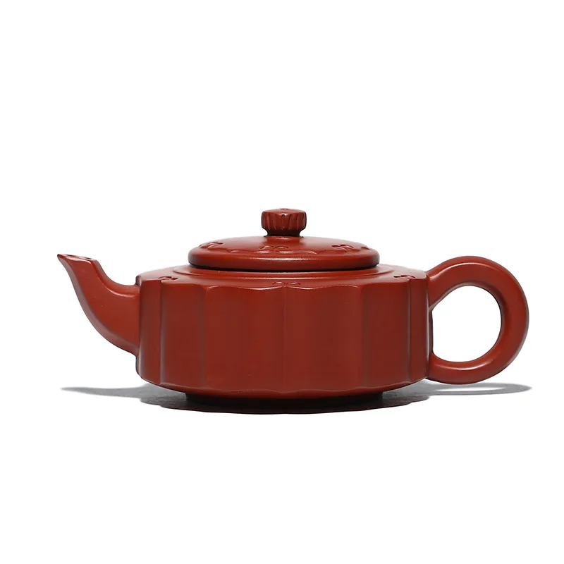 Raw ore Dahongpao purple clay teapot zhoupan teapot kungfu tea set sand in the rain
Raw ore Dahongpao purple clay teapot zhoupan teapot kungfu tea set sand in the rain