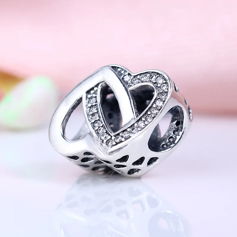 Genuine 925 Sterling Silver Beads Entwined Love Heart With Clear CZ Charms Fit pan Bracelets & Necklace DIY Jewelry
Genuine 925 Sterling Silver Beads Entwined Love Heart With Clear CZ Charms Fit pan Bracelets & Necklace DIY Jewelry