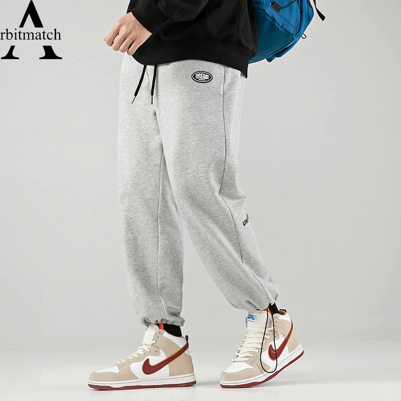 Autumn Winter Sweatpants Loose Sport Running Pants Man Drawstring Solid High Street Trousers Men Joggers Oversize Men's Pants
Autumn Winter Sweatpants Loose Sport Running Pants Man Drawstring Solid High Street Trousers Men Joggers Oversize Men's Pants