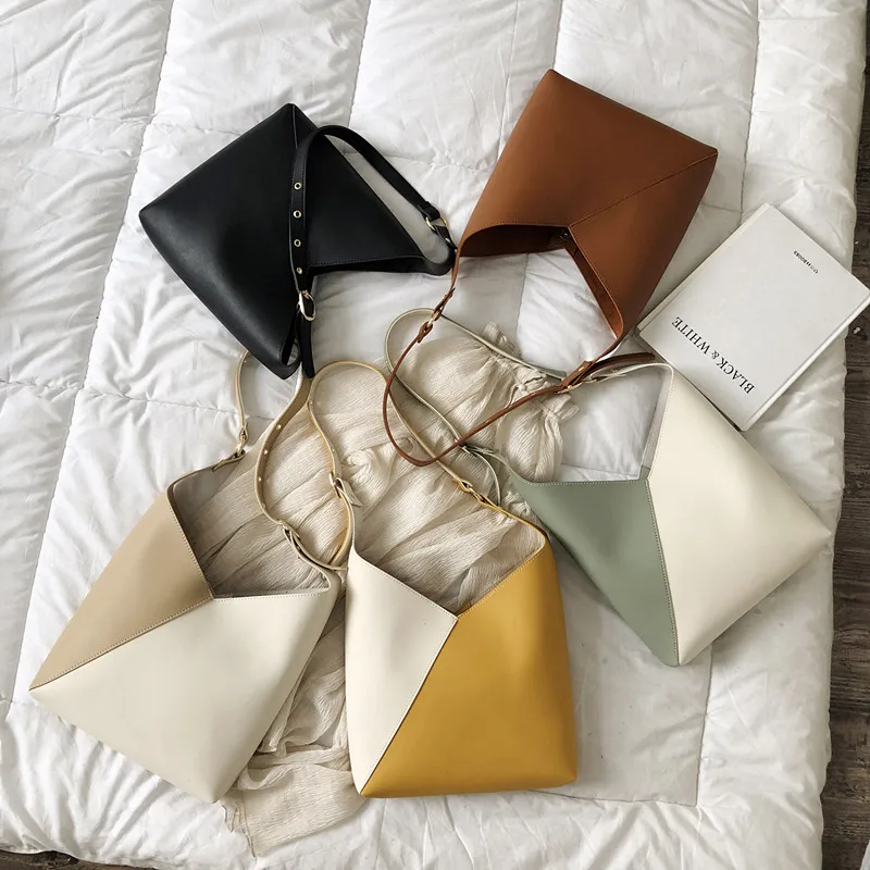 2020 ladies stitching contrast color PU leather bucket bag 2020 summer messenger bag ladies shoulder bag female travel handbag
2020 ladies stitching contrast color PU leather bucket bag 2020 summer messenger bag ladies shoulder bag female travel handbag