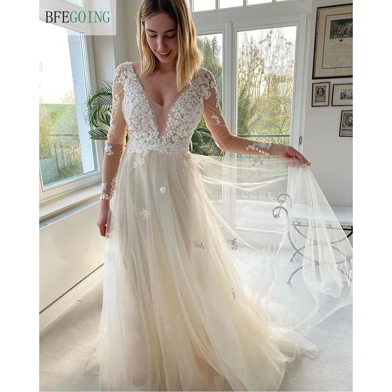 Champagne Tulle Ivory Lace V-Neck Long Sleeves Floor-Length A-Line Wedding Dresses Chapel Train Bridal Gowns Custom Made
Champagne Tulle Ivory Lace V-Neck Long Sleeves Floor-Length A-Line Wedding Dresses Chapel Train Bridal Gowns Custom Made