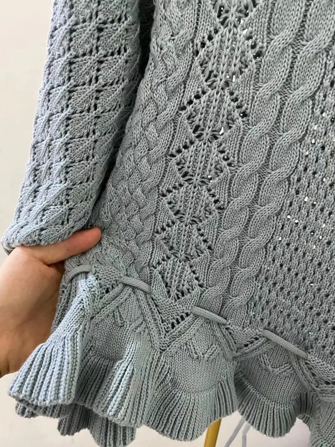 2021 Women Knitted Sweater Blue Ruffles Trim O-Neck Long Sleeve Tassel Crochet Hollow Out Knitwear Lace-Up Waist Female Top
2021 Women Knitted Sweater Blue Ruffles Trim O-Neck Long Sleeve Tassel Crochet Hollow Out Knitwear Lace-Up Waist Female Top