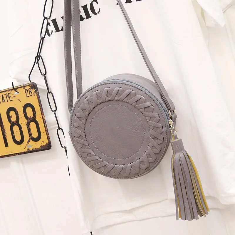 New Women's Bag Trendy Women's Shoulder Bag Solid Color Woven Tassel Small Round Bag Messenger Bag Fashion Makeup Coin Purse
New Women's Bag Trendy Women's Shoulder Bag Solid Color Woven Tassel Small Round Bag Messenger Bag Fashion Makeup Coin Purse