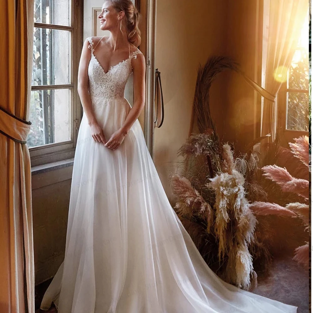Sexy Wedding Dresses Chiffon Appliques Pleat V-Neck Sleeveless Backless A-Line Bridal Gowns Novia Do 2021 New Party
Sexy Wedding Dresses Chiffon Appliques Pleat V-Neck Sleeveless Backless A-Line Bridal Gowns Novia Do 2021 New Party