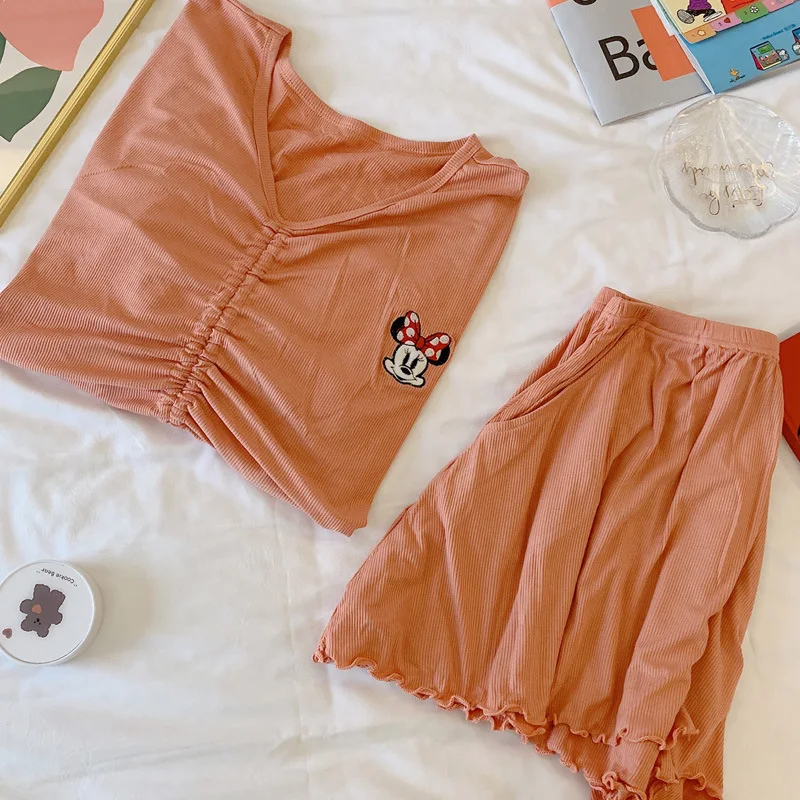 Disney Minnie ins pajamas women's summer 100% cotton short-sleeved solid color drawstring V-neck small sexy suit home service 
Disney Minnie ins pajamas women's summer 100% cotton short-sleeved solid color drawstring V-neck small sexy suit home service