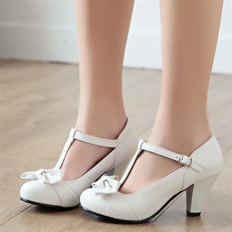 AGODOR t strap women shoes high heels pumps round toe block heel bow pumps buckle strap shoes woman big size white pink black
AGODOR t strap women shoes high heels pumps round toe block heel bow pumps buckle strap shoes woman big size white pink black