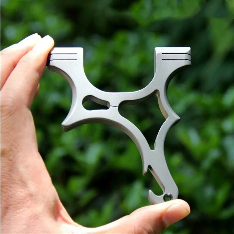 TC21 slingshot The new outdoor titanium alloy flat leather slingshot crooked handle fast press slingshot bottle opener slingsho
TC21 slingshot The new outdoor titanium alloy flat leather slingshot crooked handle fast press slingshot bottle opener slingsho