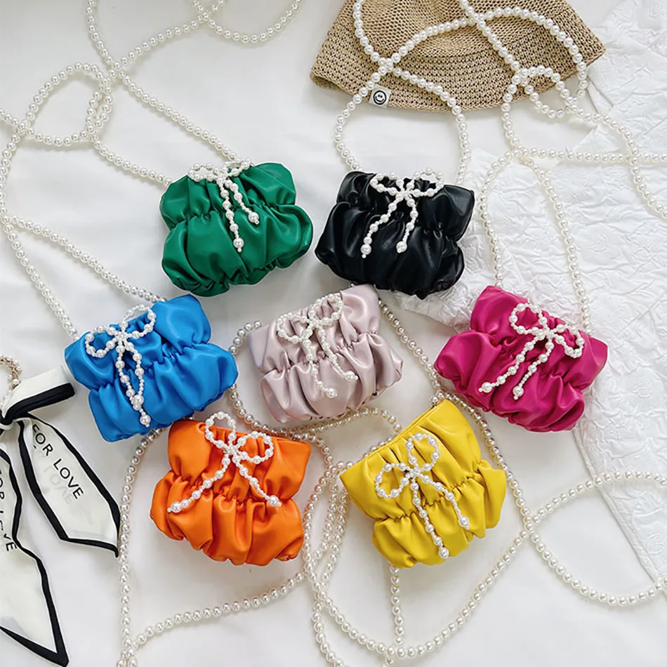 Cute Girls Slid Color Folds Crossbody Bag Women Mini Purse Children Leather Beaded Pearl Chian Purses and Handbags Kid Bow Cluch
Cute Girls Slid Color Folds Crossbody Bag Women Mini Purse Children Leather Beaded Pearl Chian Purses and Handbags Kid Bow Cluch