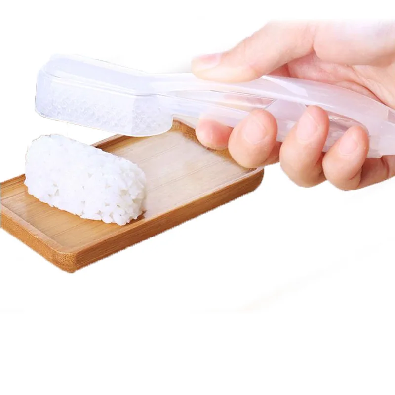 Creative DIY Japanese Hand-held Sushi Mold Making Warship Rice Ball Mold Rice Ball Artifact sushi Model Tool Kitchen Assistance
Creative DIY Japanese Hand-held Sushi Mold Making Warship Rice Ball Mold Rice Ball Artifact sushi Model Tool Kitchen Assistance