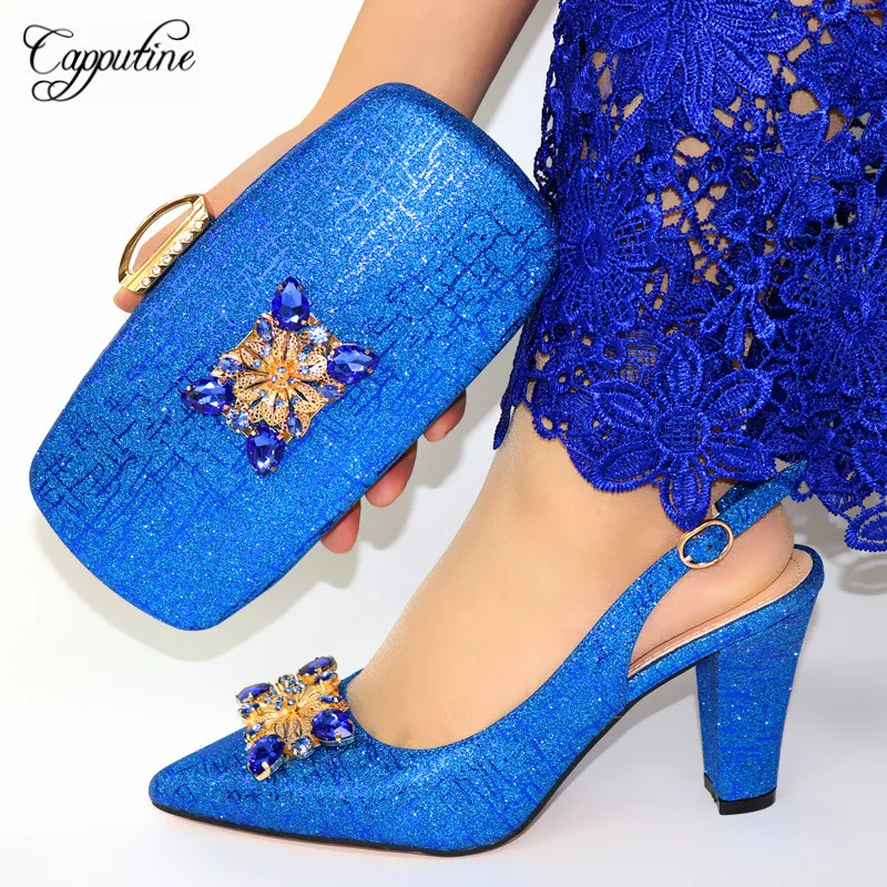 Capputine Nigerian Style Woman Blue Color Shoes With Bag Set High Quality Woman High Heels Shoes And Bags Set For Party
Capputine Nigerian Style Woman Blue Color Shoes With Bag Set High Quality Woman High Heels Shoes And Bags Set For Party