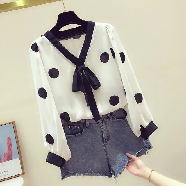 Spring and autumn new bow dotted shirt women's 2021 new Korean versatile top printed V-Neck long sleeve shirt
Spring and autumn new bow dotted shirt women's 2021 new Korean versatile top printed V-Neck long sleeve shirt