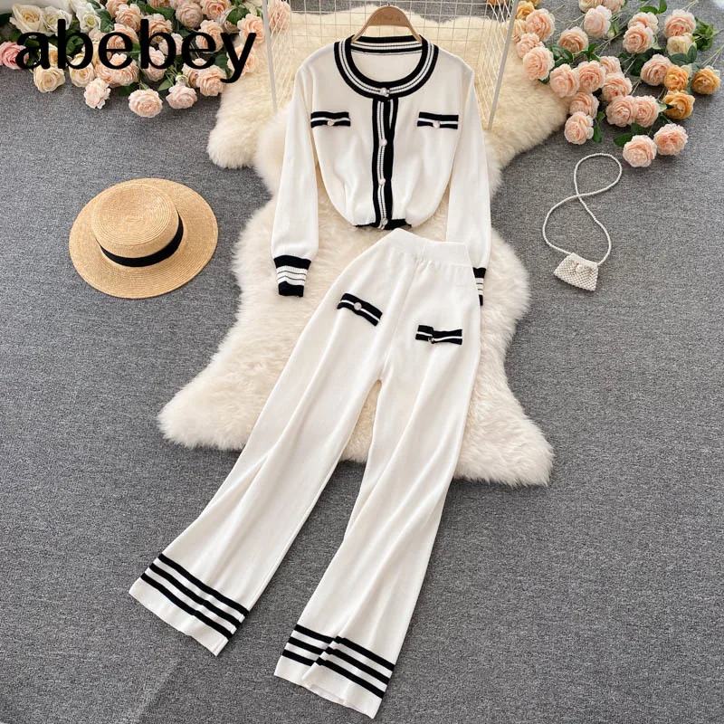 Women Autumn Winter Fashion Knitted Set Long Sleeve Single Breasted Cardigan+Wide Leg Long Pants Two Piece Suits 2021
Women Autumn Winter Fashion Knitted Set Long Sleeve Single Breasted Cardigan+Wide Leg Long Pants Two Piece Suits 2021