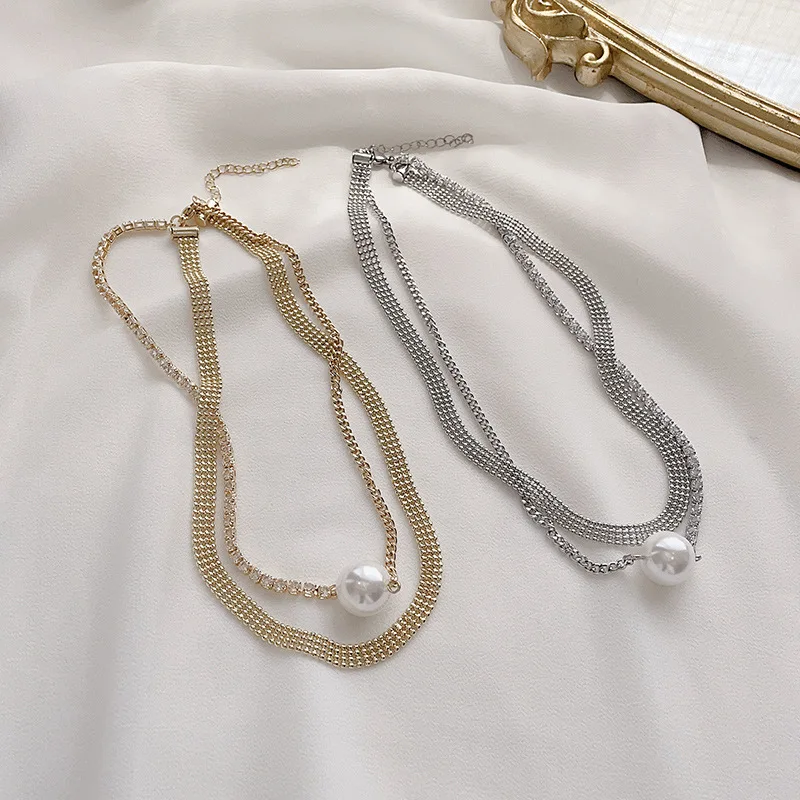 Korean version of the new fashion double layer diamond pearl necklace feminine exquisite clavicle chain
Korean version of the new fashion double layer diamond pearl necklace feminine exquisite clavicle chain