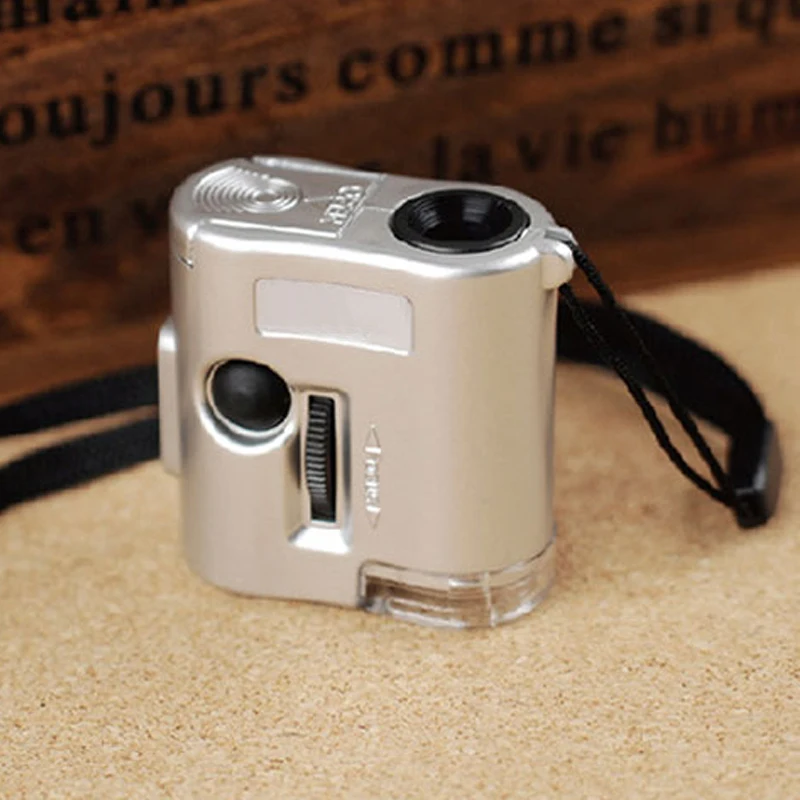 60X Mini Handheld Magnifying Glass Pocket Microscope Loupe Currency Detector Jeweler Magnifier With LED Light
60X Mini Handheld Magnifying Glass Pocket Microscope Loupe Currency Detector Jeweler Magnifier With LED Light