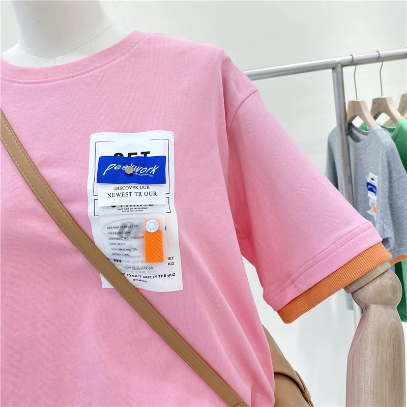 2021 Spring Summer New Labeling Short-Sleeved Female T-shirt Loose Slim Patchwork Fake Two-Piece Tee Round Neck Base Shirt Top 
2021 Spring Summer New Labeling Short-Sleeved Female T-shirt Loose Slim Patchwork Fake Two-Piece Tee Round Neck Base Shirt Top