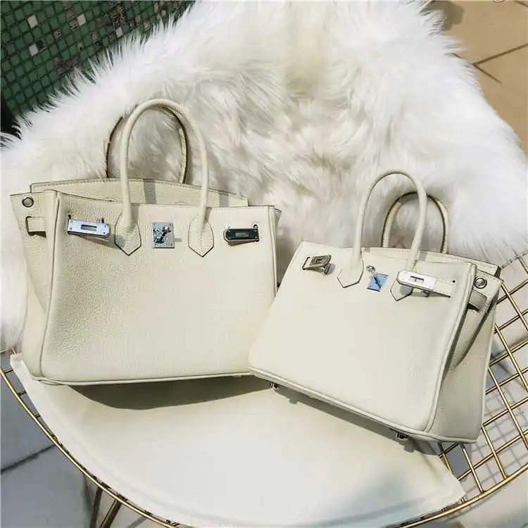 Fashion milk shake white litchi grain head leather women's bag one shoulder slant cross handbag
Fashion milk shake white litchi grain head leather women's bag one shoulder slant cross handbag