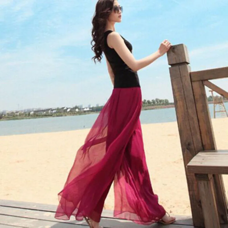 2020 New Women Wide Leg Beach Pants Summer Loose Large Size Pants Elastic Waist Skirt Pants Female Chiffon Pants Bell Bottom
2020 New Women Wide Leg Beach Pants Summer Loose Large Size Pants Elastic Waist Skirt Pants Female Chiffon Pants Bell Bottom