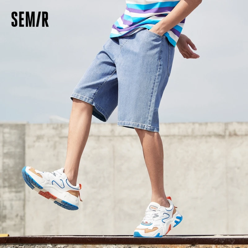 Шорты SEMIR мужские джинсовые, свободные прямые шесть точек, уличные синие штаны из денима, лето 2021
Шорты SEMIR мужские джинсовые, свободные прямые шесть точек, уличные синие штаны из денима, лето 2021