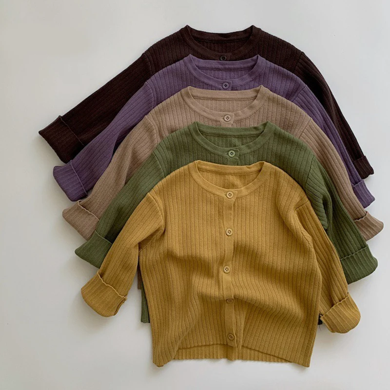 Children's knitted sweater 2021 spring and autumn new simple solid color knitted cardigan long sleeve boys' and girls' jacket
Children's knitted sweater 2021 spring and autumn new simple solid color knitted cardigan long sleeve boys' and girls' jacket