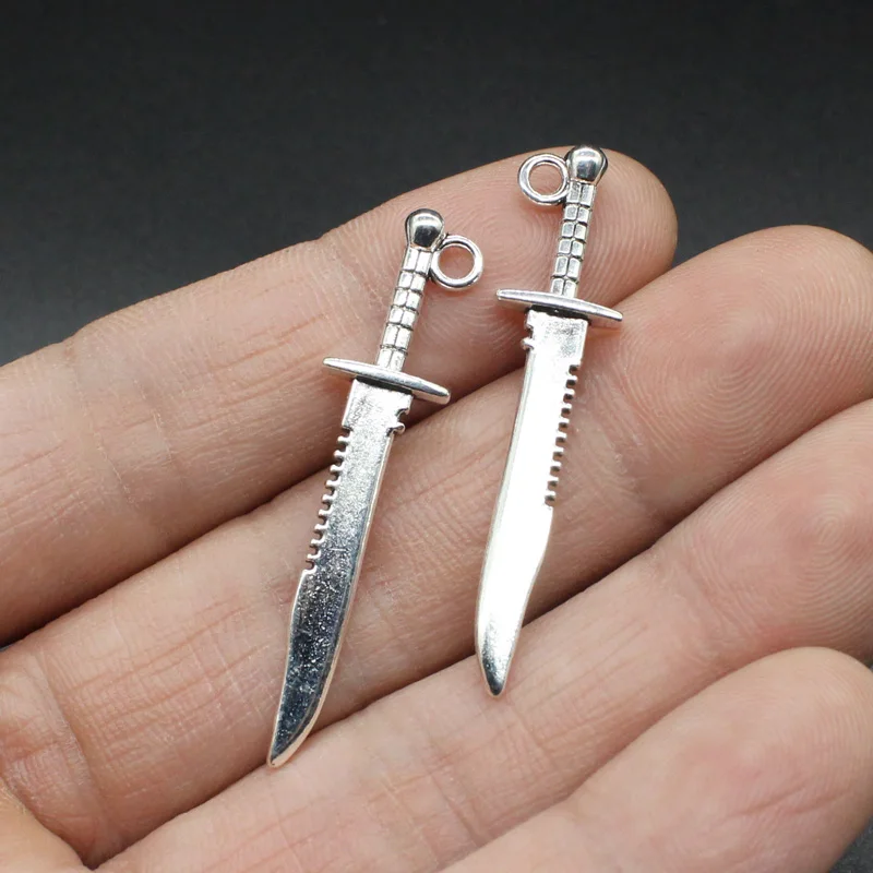 Chxiuu 42 × 10 мм 10 шт. античный серебряный цвет меч Кинжал подвески для холодца Изготовление Украшения ручной работы браслет Nacklace 
Chxiuu 42 × 10 мм 10 шт. античный серебряный цвет меч Кинжал подвески для холодца Изготовление Украшения ручной работы браслет Nacklace