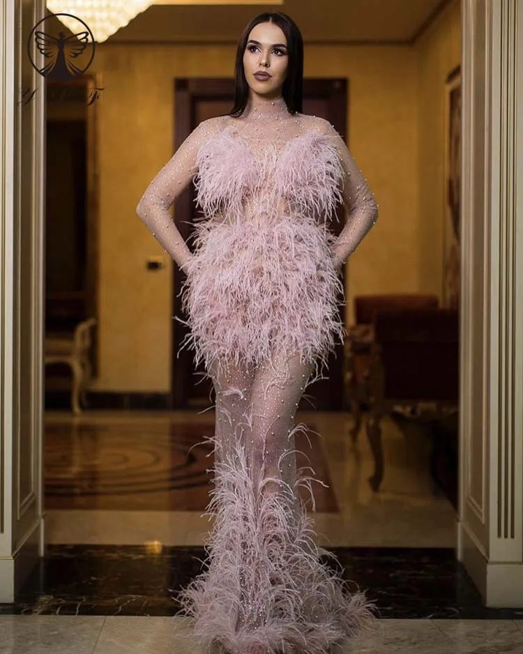 2020 Sexy Pink High Collar Beaded Pearls Bling Bling Feather Long Sleeve Keyhole Back Mermaid Evening Dresses
2020 Sexy Pink High Collar Beaded Pearls Bling Bling Feather Long Sleeve Keyhole Back Mermaid Evening Dresses