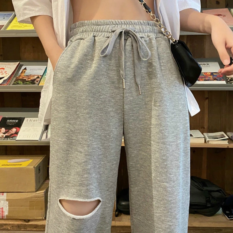 Casual Pants Women Solid Black Chic Holes Summer Spring New Trendy Drawstring Korean High Waist Femme Pant All-match Streetwear
Casual Pants Women Solid Black Chic Holes Summer Spring New Trendy Drawstring Korean High Waist Femme Pant All-match Streetwear