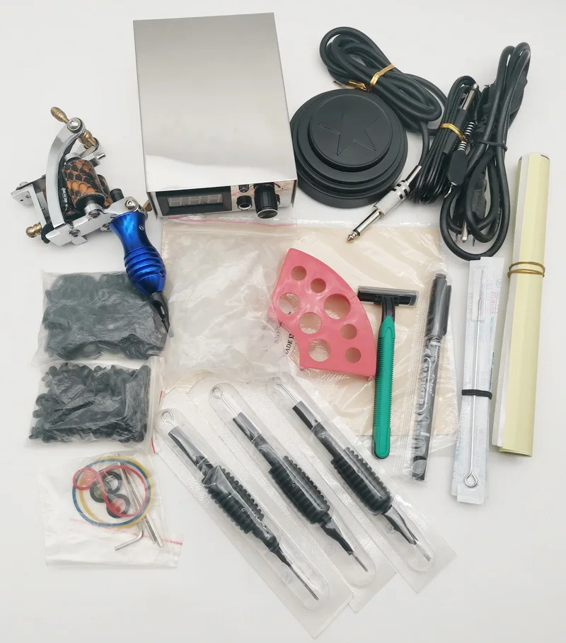 New Complete Tattoo Kit KT18 Silver 8Coils Handmade Tattoo Machine Gun Needles Power Supply Foot Pedal Needles for beginner
New Complete Tattoo Kit KT18 Silver 8Coils Handmade Tattoo Machine Gun Needles Power Supply Foot Pedal Needles for beginner