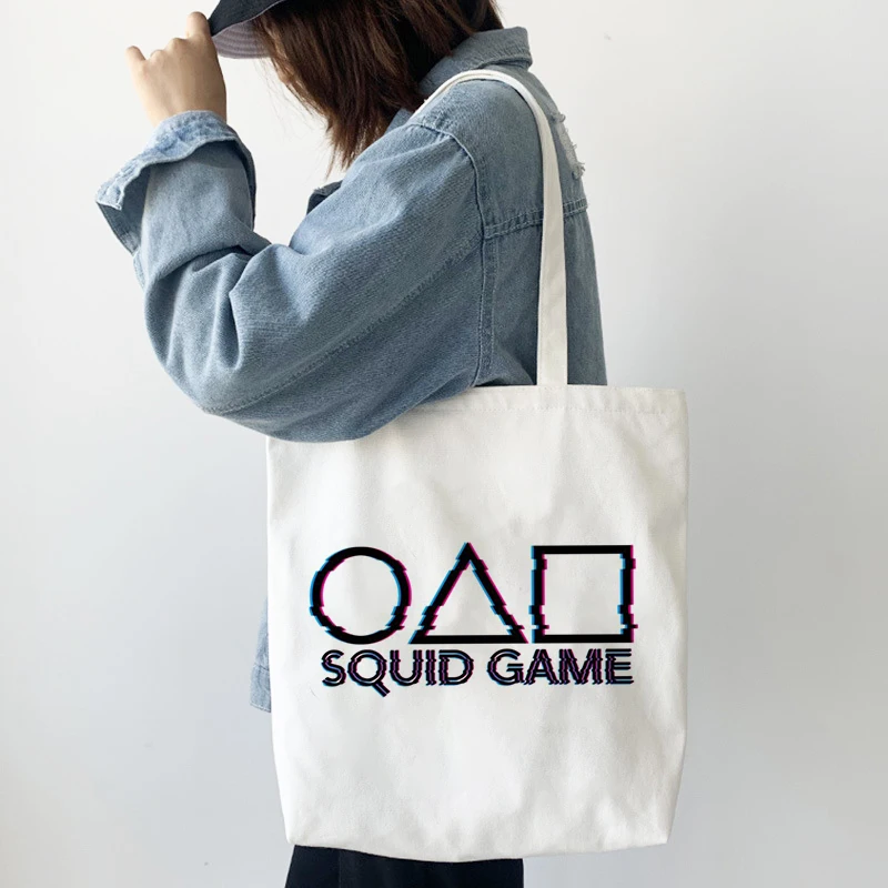 Korean Squid Game Funny Graphics Shopping Bags Harajuku Cartoon Hip Hop Bag Large Capacity Canvas Bag Women Bag College Handbag 
Korean Squid Game Funny Graphics Shopping Bags Harajuku Cartoon Hip Hop Bag Large Capacity Canvas Bag Women Bag College Handbag