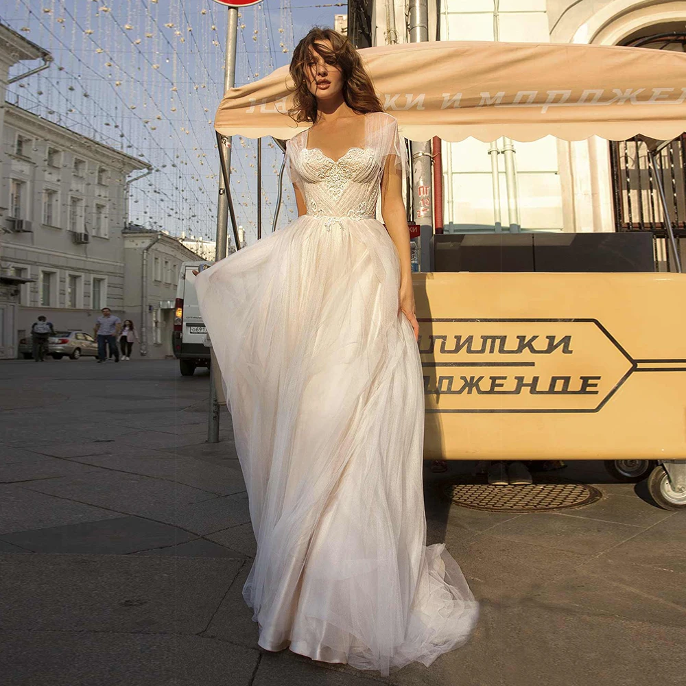 Sexy Sweetheart A Line Tulle Wedding Dresses with Appliques Cap Sleeves Lace Up Back Bridal Gown 2021
Sexy Sweetheart A Line Tulle Wedding Dresses with Appliques Cap Sleeves Lace Up Back Bridal Gown 2021