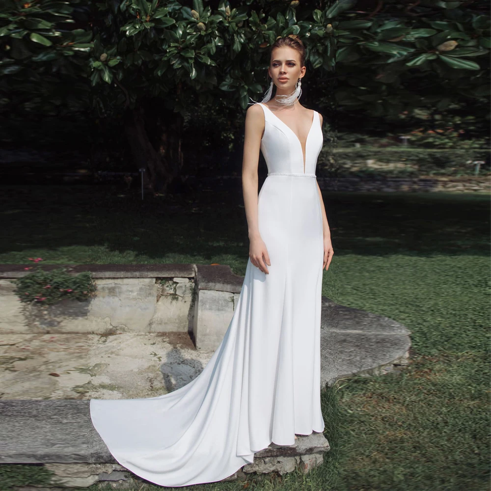 Elegant Wedding Dresses Satin V-Neck Sleeveless Backless Sheath Sweep Train Bridal Gowns
Elegant Wedding Dresses Satin V-Neck Sleeveless Backless Sheath Sweep Train Bridal Gowns
